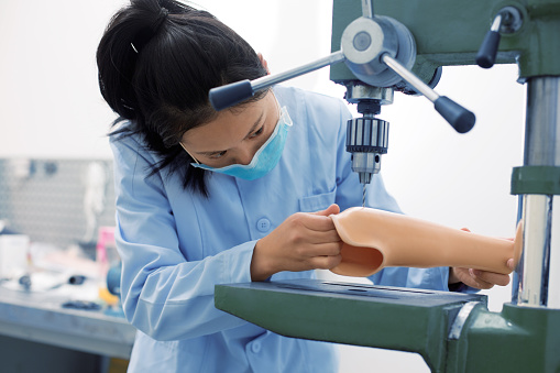 Overview of biomedical engineering in the UK, detailing high salaries and the design of medical equipment such as artificial limbs and cochlear implants.