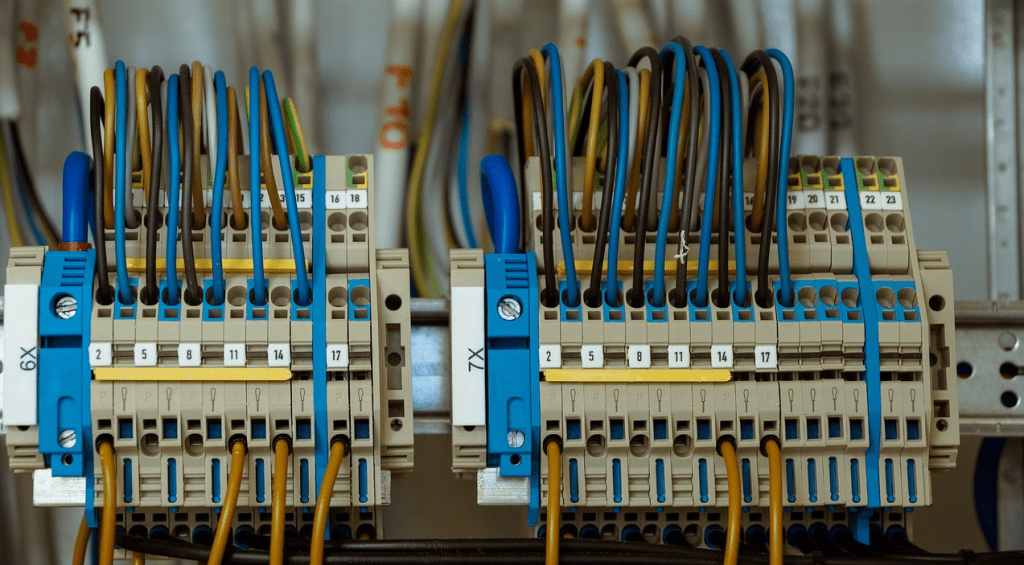 Overview of electrical engineering careers in the UK, highlighting high salaries and diverse roles in designing and maintaining electrical systems across various industries, with salary ranges from £27,000 for new graduates to over £60,000 for chartered engineers.